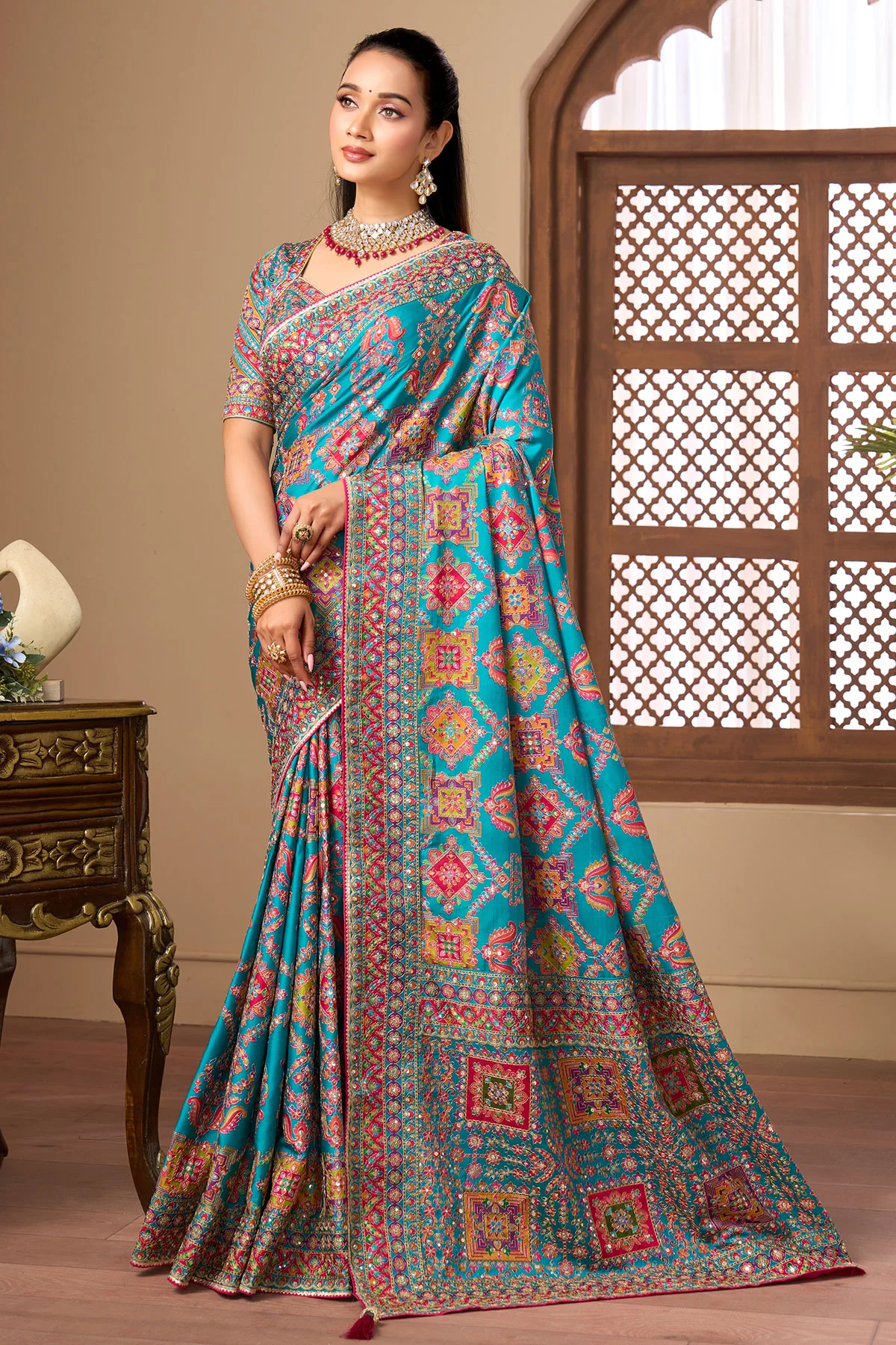 Aqua blue printed satin silk wedding wear saree